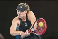  ?? Lintao Zhang/Getty Images ?? Elena Rybakina plays a backhand against Victoria Azarenka during the semifinals at the Australian Open on Thursday.