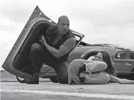  ?? PROVIDED BY PETER MOUNTAIN/UNIVERSAL STUDIOS ?? Dominic Toretto (Vin Diesel, left, with Daniela Melchior) is in a bad place at the end of “Fast X.”