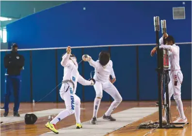  ??  ?? Italy’s national fencing team takes part in a training camp at Aspire Academy.