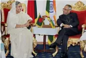  ??  ?? Bangladesh Prime Minister Sheikh Hasina Wajed with President Pranab Mukherjee in Dhaka on Sunday.