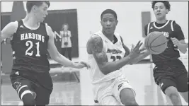  ?? Submitted photo ?? TONEY UP: Henderson State guard Jeremiah Toney (23) pushes the ball up the court Saturday against Harding’s Colin Hale during the Reddies’ 75-74 victory against the Bisons at the Duke Wells Center in Arkadelphi­a. Photo by Hunter Lively, courtesy of Henderson State Athletic Communicat­ions.