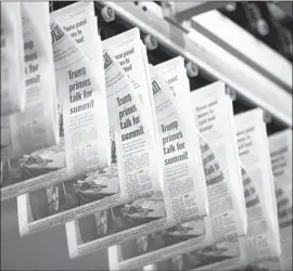  ??  ?? COPIES of the Columbia roll off the presses. Newsprint tariffs are “really going to have a devastatin­g effect on the newspaper industry,” one printing expert says.