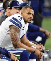  ?? MAX FAULKNER / FORT WORTH STAR-TELEGRAM ?? Dak Prescott’s first three-intercepti­on game in two seasons with the Cowboys came in his second game without Ezekiel Elliott.