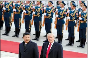  ?? AP ?? President Donald Trump, shown with Chinese President Xi Jinping last November during a state visit to Beijing, is to meet with Xi at the Group of 20 summit in Buenos Aires, Argentina, on Friday and Saturday.