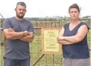  ??  ?? Ben and Melissa McCoy will continue their fight against the Longwarry saleyards developmen­t.