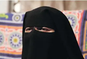  ?? MAYA ALLERUZZO / THE ASSOCIATED PRESS FILES ?? A Canadian study has found that Islamic face veils like the niqab were the only kind of covering that appear to make it easier for people to detect liars.