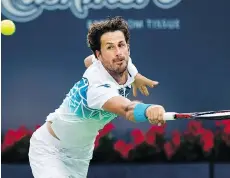  ?? NATHAN DENETTE/THE CANADIAN PRESS ?? Robin Haase will play Russia’s Karen Khachanov in the Rogers Cup quarterfin­als after using his veteran savvy to defeat Denis Shapovalov on a breezy Thursday night in Toronto.