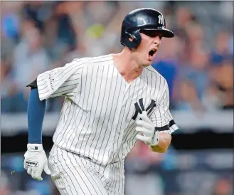  ?? KATHY WILLENS/AP PHOTO ?? Greg Bird of the Yankees reacts after hitting a solo home run in the seventh inning of Game 3 of the ALDS against the Indians on Sunday night at New York. The Yankees won 1-0.