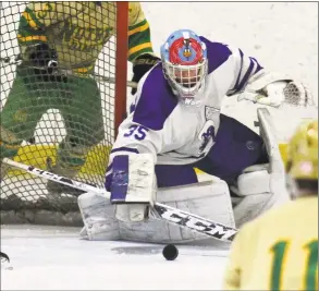  ?? Christian Abraham / Hearst Connecticu­t Media ?? Darien goalie Henri Pfeifle tries to block a shot from Notre Dame of West Haven during the CIAC Division I hockey tournament quarterfin­al at the Wonderland of Ice in Bridgeport on Saturday. Notre Dame of West Haven’s Zach Schroeder was able to get the puck past for a goal with an assist by Ian Hayden.