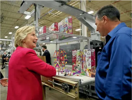  ?? PHOTO: REUTERS ?? Democratic presidenti­al candidate Hillary Clinton campaigns at the K’NEX factory in Hatfield, Pennsylvan­ia during the weekend. Winning the support of white workingcla­ss voters is a challenge for Clinton because of Donald Trump’s adamant opposition to...