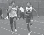  ?? LORRIE CECIL/THISWEEK ?? Pickeringt­on Central’s Troy Lane races Westervill­e Central’s Justin Braun in the 100 meters on April 15. Braun figures to be Lane’s toughest competitio­n in his pursuit of a Division I state title.