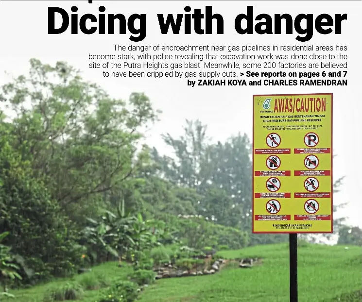  ?? — YAP CHEE HONG /The Star ?? A community garden in Subang Jaya, Selangor, with rock garden and banana plants, encroachin­g into land designated for a gas pipeline. Safety concerns: