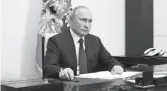  ??  ?? Președinte­le rus Vladimir Putin vorbește despre acordul semnat privind oprirea completă a acțiunilor de luptă asupra regiunii Nagorno-Karabakh la reședința de stat Novo-Ogaryovo din afara Moscovei, Rusia, 10 noiembrie 2020. Sputnik / Aleksey Nikolskyi / Kremlin