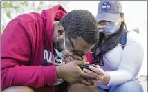  ?? AP ?? London Williams, 31, of Harrisburg, Pa., bursts into tears Tuesday in Washington, D.C., after hearing former Minneapoli­s police Officer Derek Chauvin was convicted in the death of George Floyd.