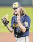  ?? Jeff Roberson / Associated Press ?? Brewers relief pitcher Josh Hader celebrates after getting the final out against the Cardinals on Saturday.