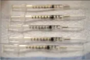  ?? NAM Y. HUH — THE ASSOCIATED PRESS FILE ?? Prepared COVID-19 Pfizer-BioNTech vaccine syringes lay out at Edward Hospital in Naperville, Ill.