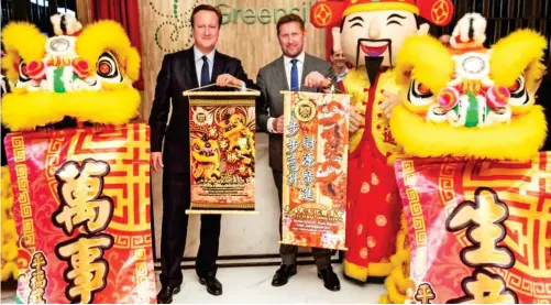  ??  ?? Accusation­s: David Cameron and Greensill executive Ilkka Tales opening Greensill’s Singapore office in late 2019