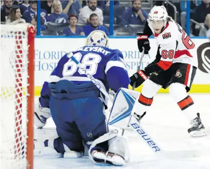  ?? CHRIS O’MEARA / THE ASSOCIATED PRESS ?? Ottawa forward Mike Hoffman, right, would be one of the more desirable prospects available if Senators general manager Pierre Dorion decides to make a trade to shake up his struggling squad. The Sens currently sit 14 points out of a playoff spot.