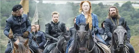  ?? UNIVERSAL PICTURES ?? Saoirse Ronan, second from right, lights up the screen in Mary Queen of Scots, despite the film’s standard “royal” fare.