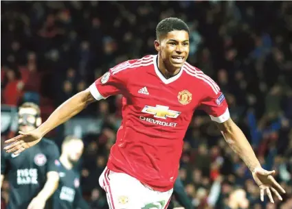  ??  ?? Marcus Rashford celebrates after scoring during the Europa League round of 32 second leg soccer match between Manchester United and FC Midtjyllan­d in Manchester, England, Thursday, Feb. 25, 2016