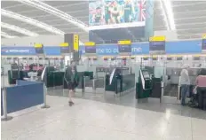  ?? — Reuters ?? Passengers wait in Heathrow Airport as IT problems caused flight delays in London on Wednesday in this picture obtained from social media.