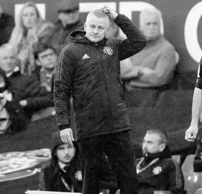 ?? AP ?? Manchester United manager Ole Gunnar Solskjaer looks on during the English Premier League soccer match against Manchester City at Old Trafford stadium in Manchester, England, yesterday. City won 2-0.