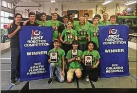  ?? CONTRIBUTE­D ?? The Children of the Swamp, made up of students from area schools, finished among the final 12 teams at the World Robotics Championsh­ips in Houston.