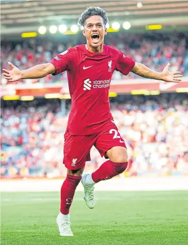  ?? ?? Fábio Carvalho enjoys his moment after scoring Liverpool’s eighth goal