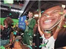  ?? ANGELA PETERSON / MILWAUKEE JOURNAL SENTINEL ?? Fan Ximena Guerrero celebrates when Giannis Antetokoun­mpo is announced as the NBA MVP in June 2019.