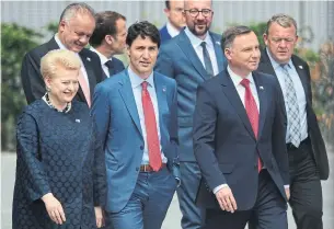  ?? SEAN GALLUP/GETTY IMAGES ?? Prime Minister Justin Trudeau, seen arriving with other NATO leaders at the groups’s summit, has more pressing domestic concerns — a reality which the U.S. president’s hectoring cannot change.
