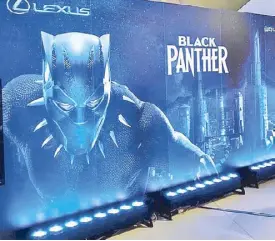  ??  ?? Lighted Black Panther tarpaulin.