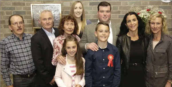  ??  ?? Kilcoole NS pupil Louis Thomas at his Confirmati­on in the Church of St Anthony, with Patrick Lynch, Dylan Thomas, Phyllis Fox, Alice Thomas, Sadhbh McDonnell, sponsor Jamie Lynch, Valerie Thomas and Karen Wood.