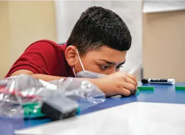  ?? Marie D. De Jesús / Staff photograph­er ?? Best Elementary School second-grade student Christofer Alvarenga practices counting during a math interventi­on class Thursday. The specialize­d, small-group instructio­n helps catch up students struggling academical­ly.