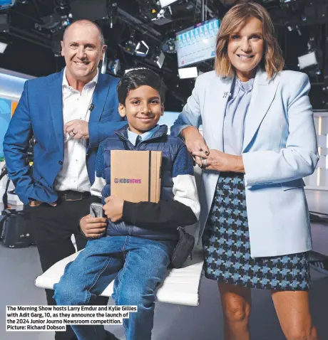  ?? ?? The Morning Show hosts Larry Emdur and Kylie Gillies with Adit Garg, 10, as they announce the launch of the 2024 Junior Journo Newsroom competitio­n. Picture: Richard Dobson