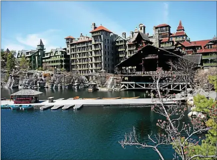  ?? TANIA BARRICKLO—DAILY FREEMAN, FILE ?? The Mohonk Mountain House as seen from the lakeside in this 2015 photo.