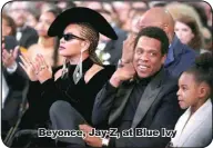  ??  ?? Beyonce, Jay-Z, at Blue Ivy