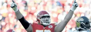  ?? THE CANADIAN PRESS FILES ?? Kansas City Chiefs offensive lineman Laurent Duvernay-Tardif (76) celebrates after a field goal against the Jacksonvil­le Jaguars on Nov. 6, 2016. Duvernay-Tardif is one of 13 Canadians to make a Week 1 NFL roster.