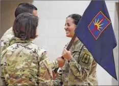  ?? New York Army National Guard ?? Maj. Amy Crounse receives the guidon of the Joint Force Headquarte­rs and Headquarte­rs Detachment.