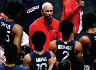  ?? File photo ?? UConn fans are drinking hot sauce after Dan Hurley’s Huskies win games to raise money for the Husky Project, which helps underprivi­leged kids watch UConn games.