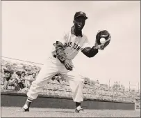  ?? THE ASSOCIATED PRESS FILE PHOTO ?? Pumpsie Green in 1959 joined the Boston Red Sox, who were infamous for not wanting Black players, or even other Black employees.