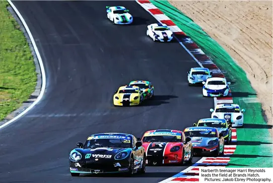  ?? ?? Narberth teenager Harri Reynolds leads the field at Brands Hatch.
Pictures: Jakob Ebrey Photograph­y.