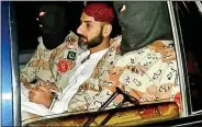  ?? DAWN ?? Uzair Baloch is being taken by Pakistani Rangers in Karachi on Saturday.