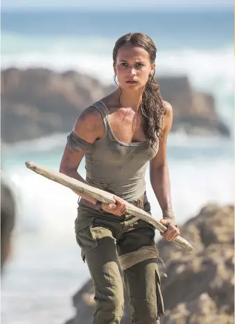  ?? WARNER BROS. ?? Swedish actress Alicia Vikander’s Lara Croft may not have the traditiona­l look of a Playboy centrefold, but she’s more believable than the previous incarnatio­n portrayed by Angelina Jolie.