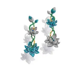 ?? Celestial Lotus earrings,
ANNA HU ?? JEWELLERY FROM TOP The Art Jewel Sapphire Dragonfly brooch, CINDY CHAO