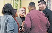  ?? JOHN J. KIM/CHICAGO TRIBUNE ?? Democratic committee member and state Sen. Iris Martinez talks to Ald. Carlos Ramirez-Rosa, right, as Ald. Ariel Reboyras, center, listens before a Nov. 15 meeting about filling the vacated seat of former state Rep. Luis Arroyo.