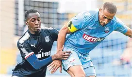  ??  ?? Glen Kamara, left, goes up against Bolton’s Darren Pratley.