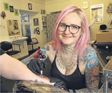  ??  ?? A TAYSIDE tattoo parlour is starting the new year in a new home.
Liquorice Tattoo and Piercing Studio, in Kirriemuir, has relocated to 34 Glengate after water damage at their old premises in Bellies Brae caused the ceiling to collapse in...