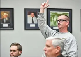  ?? Valley Democrat-Gazette/Hank Layton) ?? Will Schnauffer of Greenwood asks a question during the hearing about proposed rate increases for customers.
(River