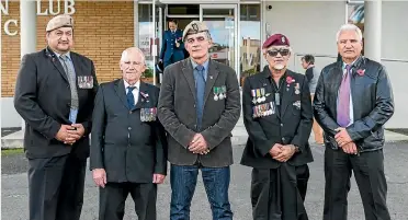  ??  ?? Ex-soldiers Phil Hokianga, Ron ‘Snow’ Collins, Stephen Pene, Lonny Matiu and Donald Carmichael at the Raglan Club after the parade.