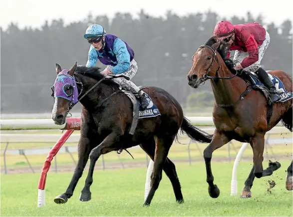  ??  ?? Jordan Nason, foot out of the iron, urges Smedley clear of Kaharau in the Whangarei Cup.